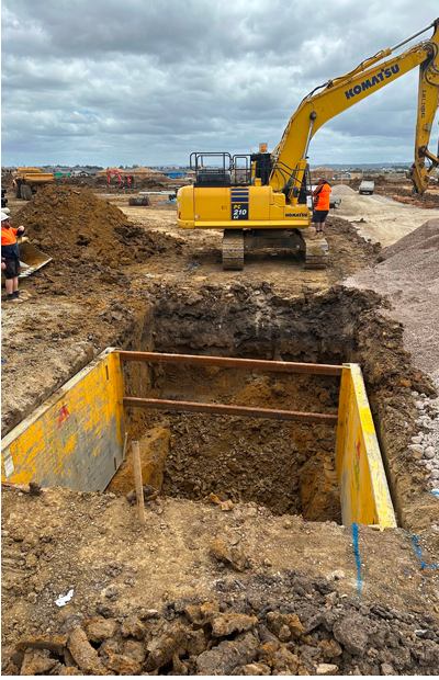 Excavator preparing trench works