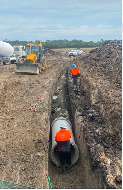 Pipe installation in an open trench